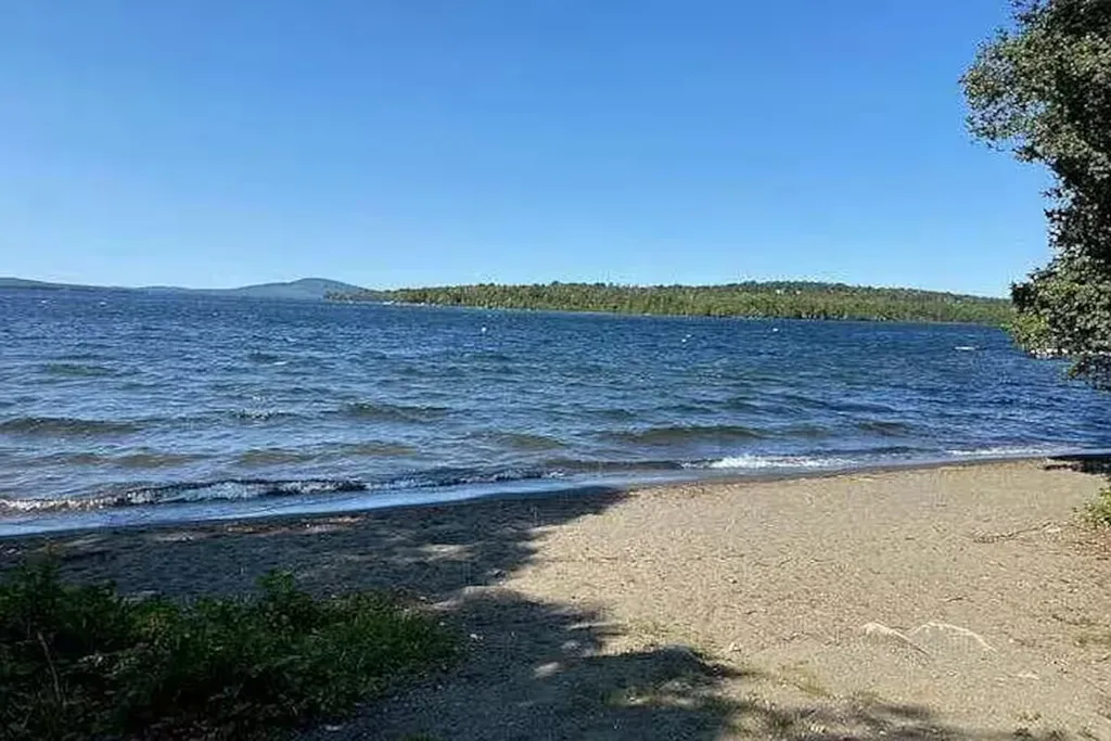 Shared beach beside Rangeley Lake