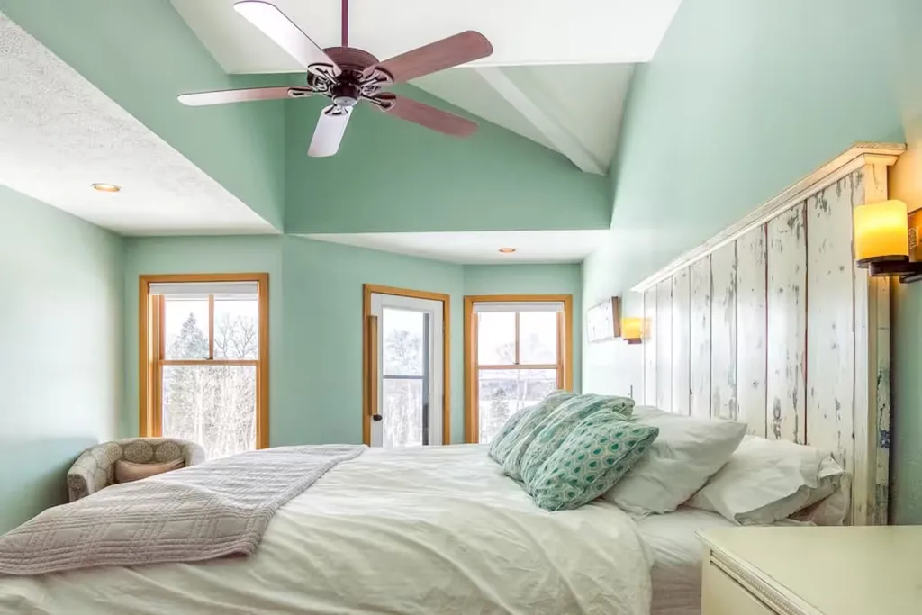 Green-walled bedroom